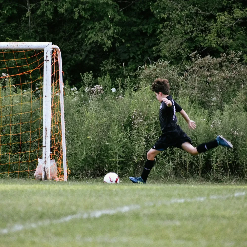 Soccer enfant terrain